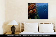 Load image into Gallery viewer, Gallery Wrapped Canvas, Freediver Descending Along The Vivid Reef Wall Red Sea Egypt